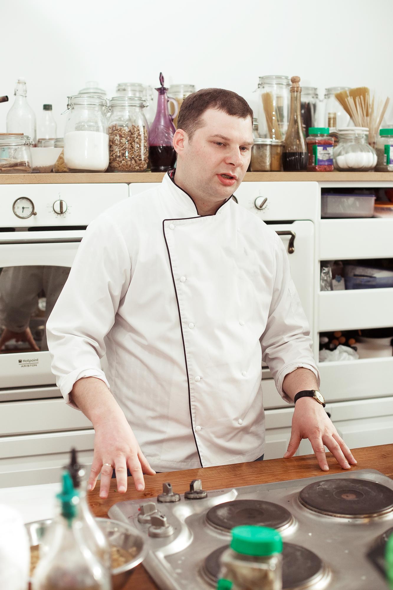 Inviting studio kitchen with chef at counter